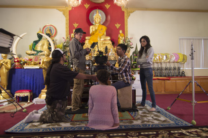 Young Skylar played by Avyn Lee with the crew shooting in the buddhist temple